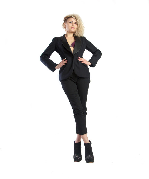 young blonde woman in black business suit - Фото, изображение