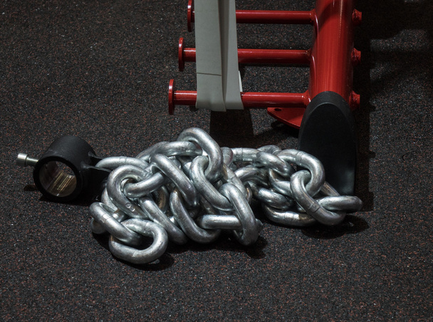 Heavy metal chain for strength training on the floor - Photo, Image