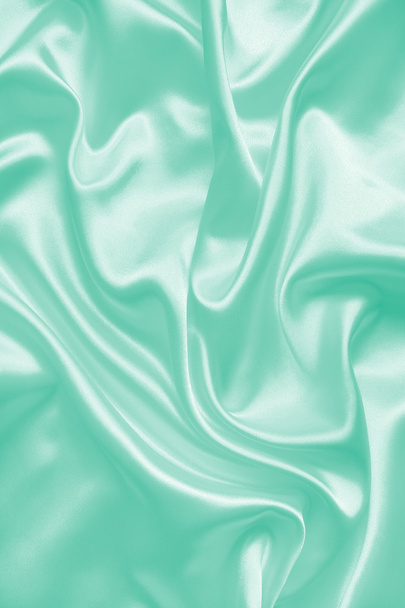 Smooth elegant green silk or satin texture as background - Foto, Bild