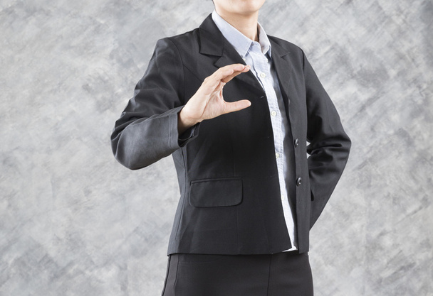 gesture of businesswoman hand holding something - Foto, imagen