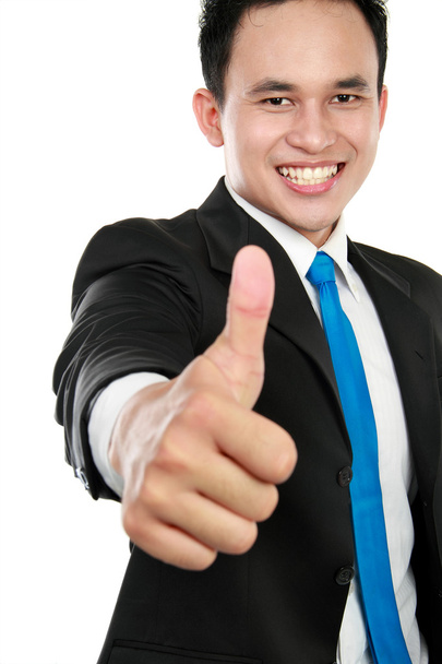 Business man showing thumbs up sign - Foto, afbeelding