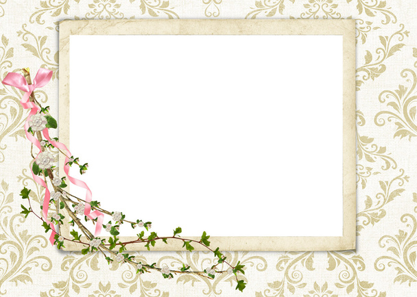 Floral twig on frame with bow - Фото, изображение