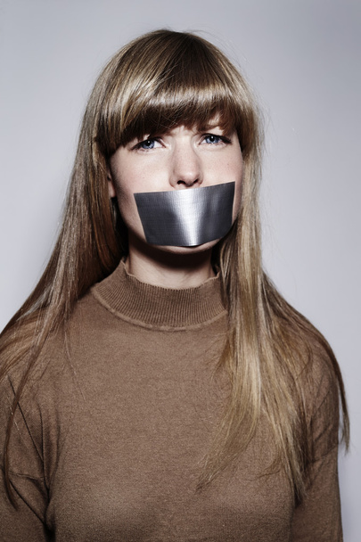 Blond woman with tape - Foto, immagini