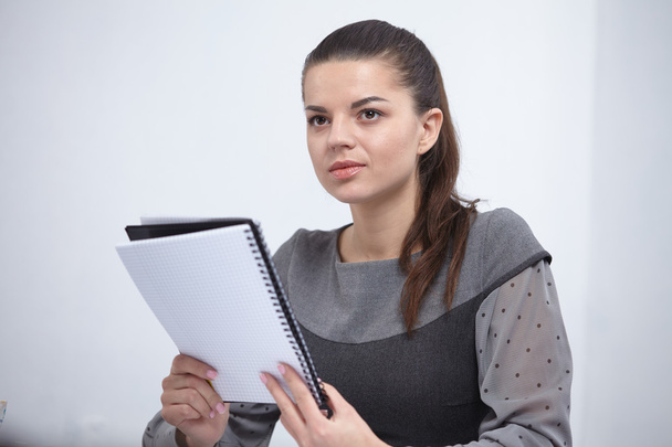 Business lady with a notepad - Photo, image