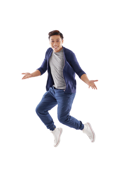 Surpris jeune homme sautant
 - Photo, image