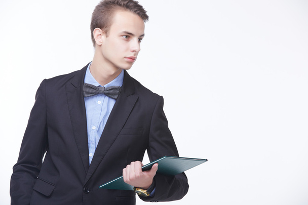 Young confident businessman with folder  - Fotó, kép