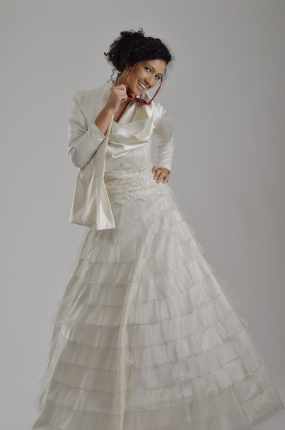 Portrait of a beautiful woman dressed as a bride - 写真・画像