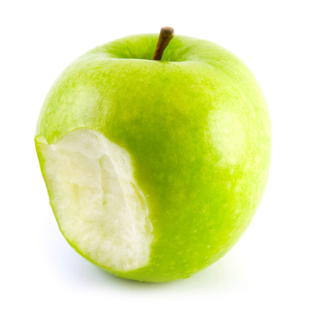 The bitten off green apple - Foto, imagen