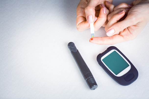 Testing High Blood Sugar With Glucometer, Blood glucose meter - Фото, изображение
