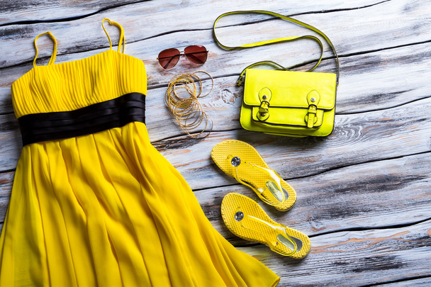 Yellow dress and lime handbag. - Photo, Image