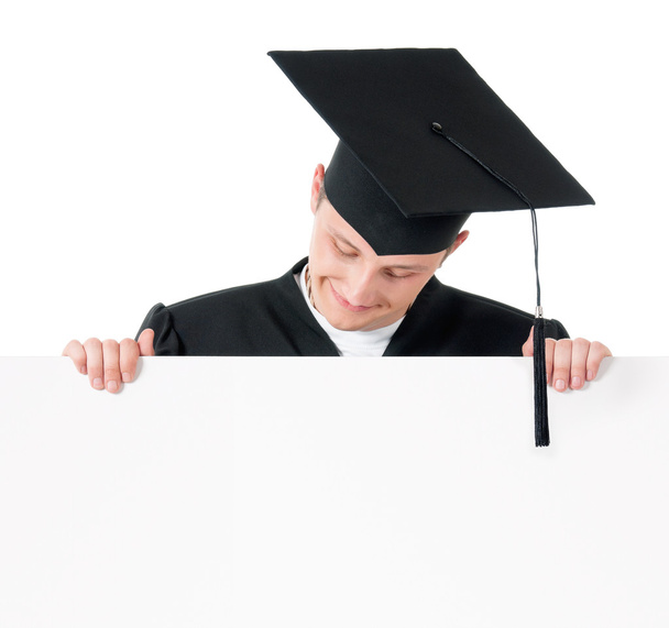 Estudiante graduado mostrando en blanco
 - Foto, imagen
