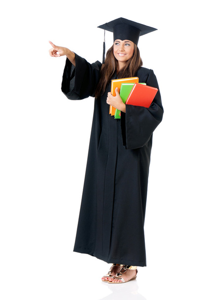 Student in mantel iets tonen - Foto, afbeelding