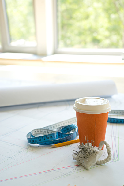 designre studio.  sewing tools and coffee on table - Photo, Image