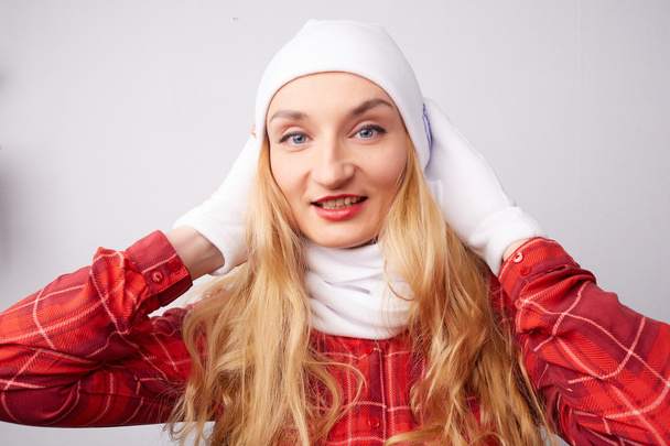 Beautiful girl in white hat and scarf - 写真・画像