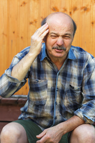  Headaches and migraines of white old man. - Photo, Image