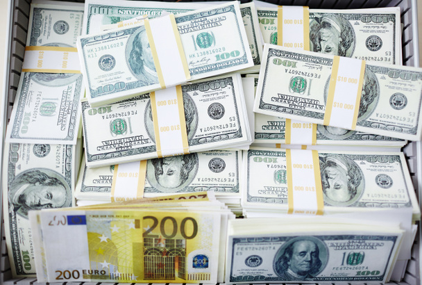 dollarin setelit ja eurosetelit
 - Valokuva, kuva