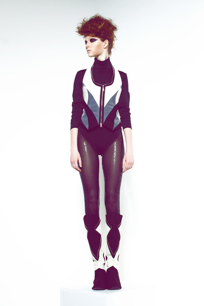 Girl in futuristic clothes - Фото, изображение