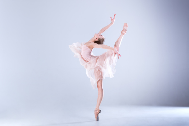 Modern Ballerina dancing in the studio - Fotó, kép