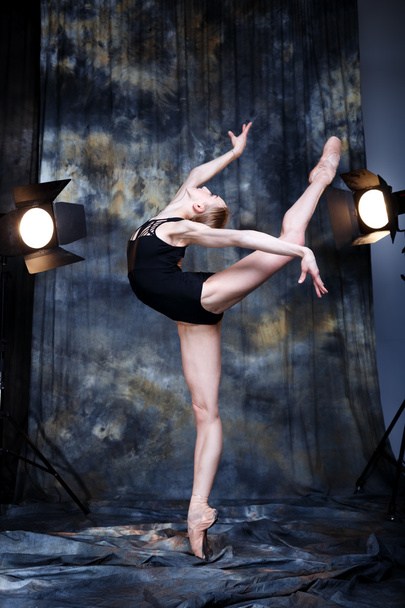 Modern Ballerina dancing in the studio - Fotó, kép