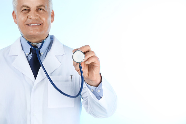 Professional doctor with stethoscope - Фото, зображення