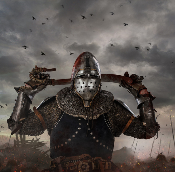 Chevalier avec épée sur le champ de bataille
  - Photo, image