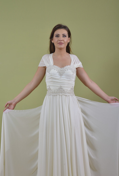 Portrait of a beautiful woman dressed as a bride - Fotoğraf, Görsel