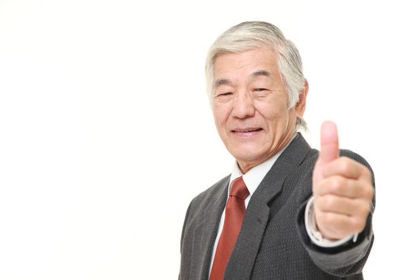 senior Japanese businessman with thumbs up gesture - Fotó, kép