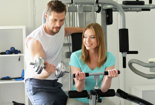  Attractive couple at the gym - Photo, Image
