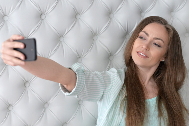 Pretty girl taking selfie - Photo, image