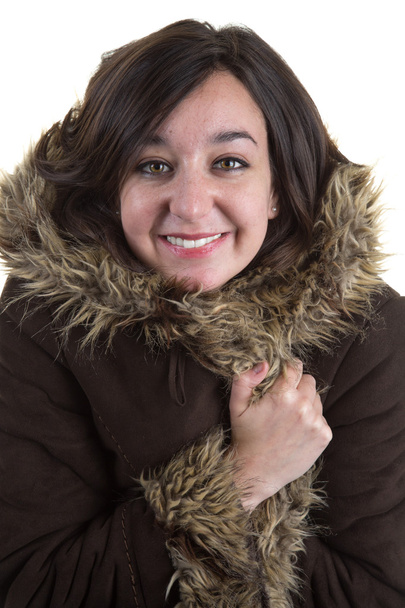 Fashion beautiful woman posing in fur coat. - Photo, Image