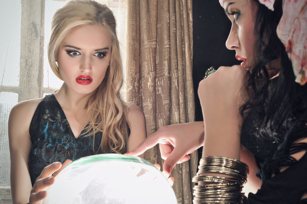 Fortune teller with her crystal ball - Photo, Image
