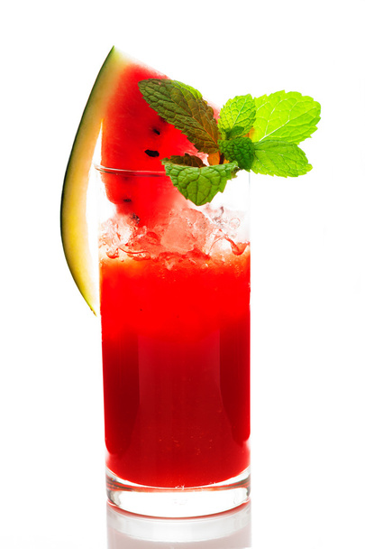 Watermelon smoothie garnished with watermelon slices and mint le - Фото, зображення