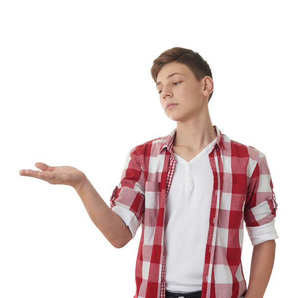 Cute teenager boy over white isolated background - Foto, Bild