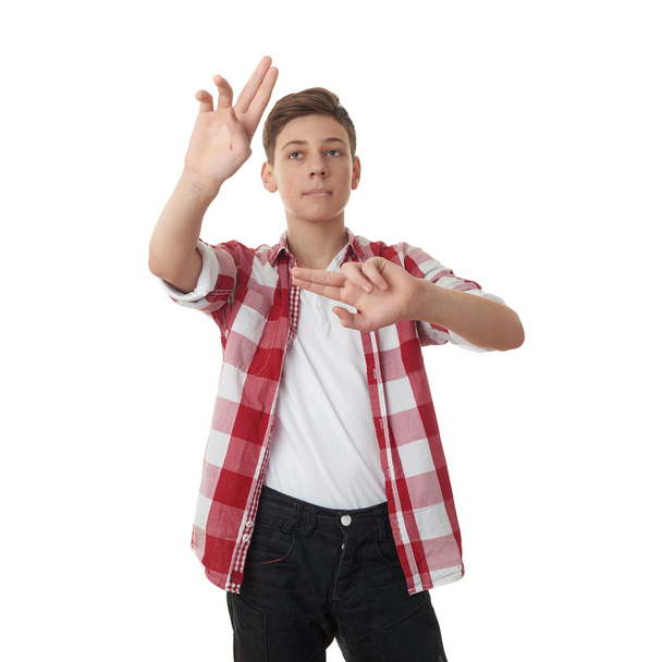 Cute teenager boy over white isolated background - Foto, Bild