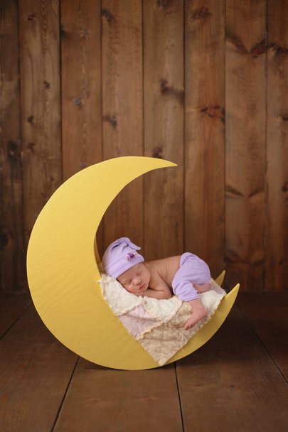 Newborn Girl Sleeping on the Moon - Photo, Image