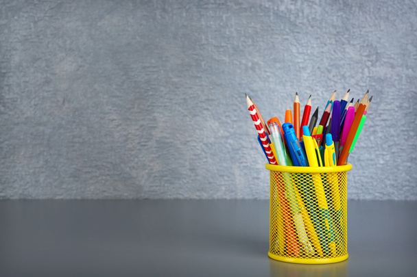 Pencils and pens in metal holder   - Fotó, kép