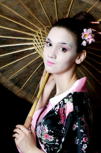 The beautiful girl with a make-up of the Japanese - Valokuva, kuva