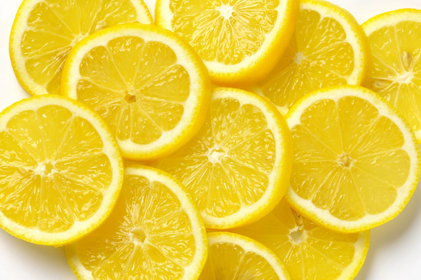 slices of fresh lemon - Foto, afbeelding