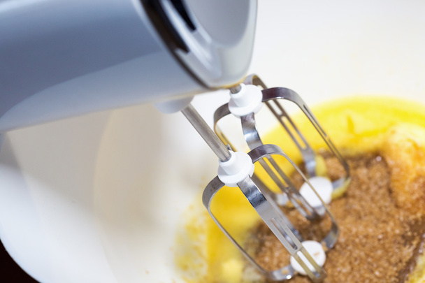 Whisking dough with mixer - Фото, изображение