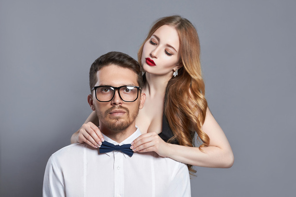 fashionable couple.girl and hipster - Фото, изображение