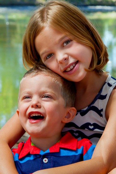Sister Holds Laughing Brother - Photo, Image