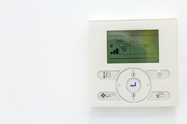Modern digital electronic thermostat, climate control system. - Photo, Image
