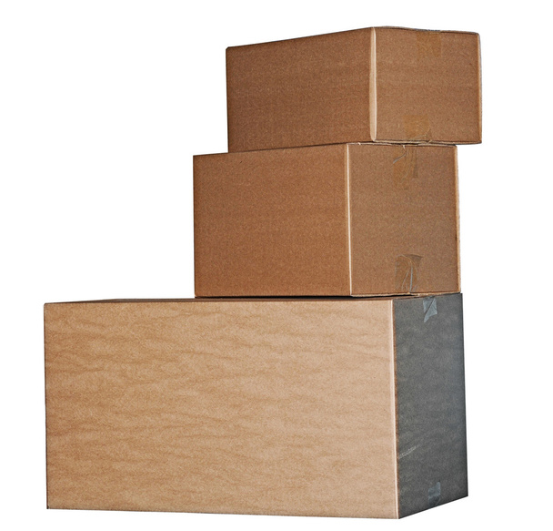 Brown cardboard boxes arranged in stack on white background - Photo, Image