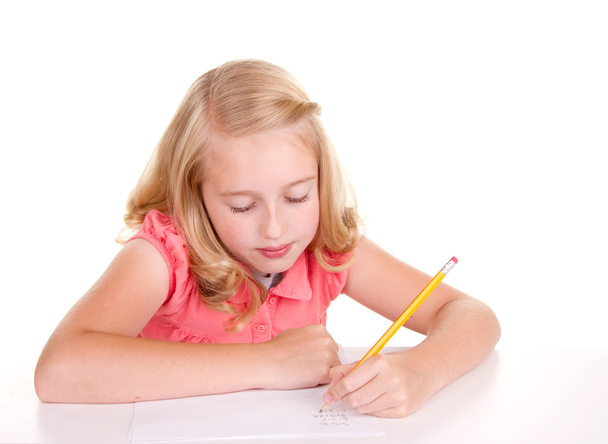Older child or teenager doing math - Foto, imagen