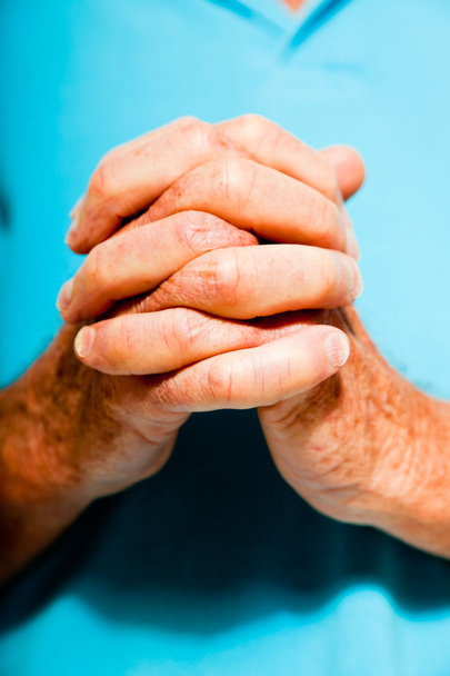 Spiritual hands of senior man. Closeup. Studio shot. - Photo, Image