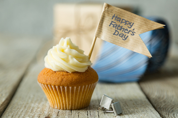 Fathers day concept - cupcake, tie, present - Фото, изображение