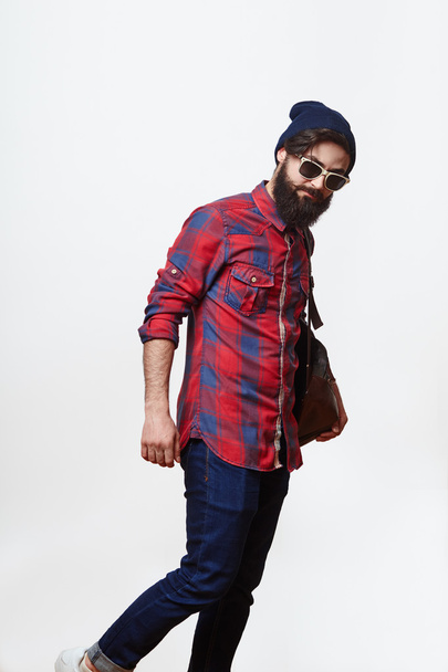 handsome bearded man with sunglasses and backpack - Photo, Image