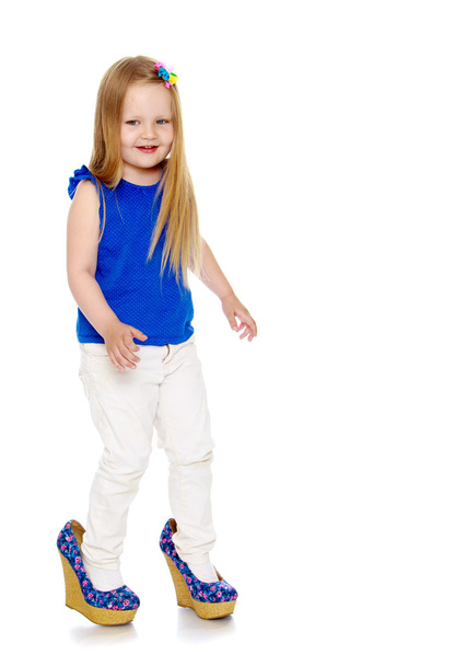 Girl in moms shoes - Фото, зображення