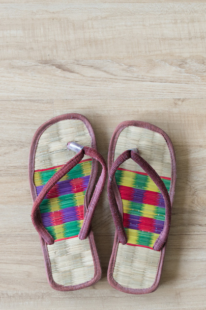 spa cozy weave sandal on wooden floor. - Photo, Image
