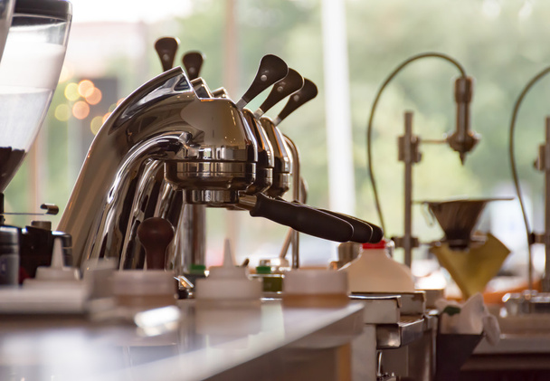 Professional Espresso Press in a Modern Coffee Shop - Фото, изображение